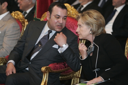 Morocco's King Mohamed VI and U.S. Secretary of State Hillary Clinton, right, speak during the presentation of a solar energy project in Ouarzazate Nov. 2, 2009. (Rafael Marchante/Reuters)